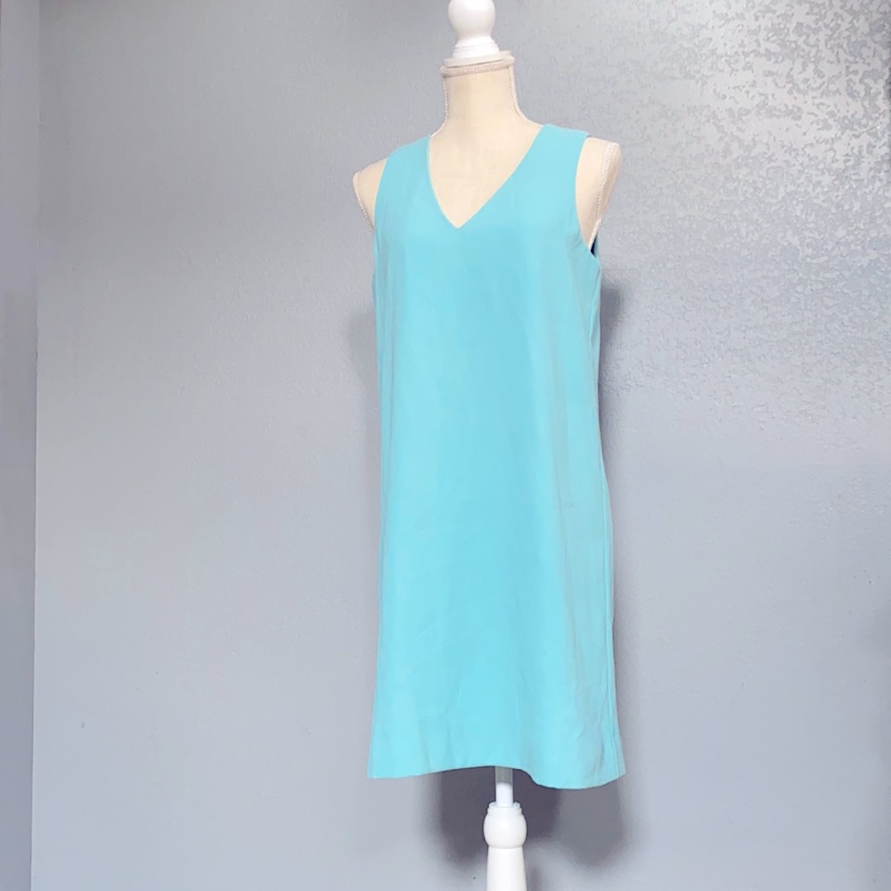 Teal in color Dress